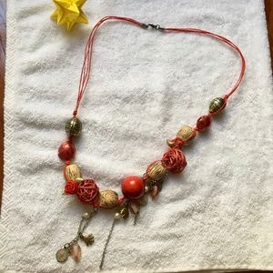 Assorted Charm and Pendant Red Fabric Necklace